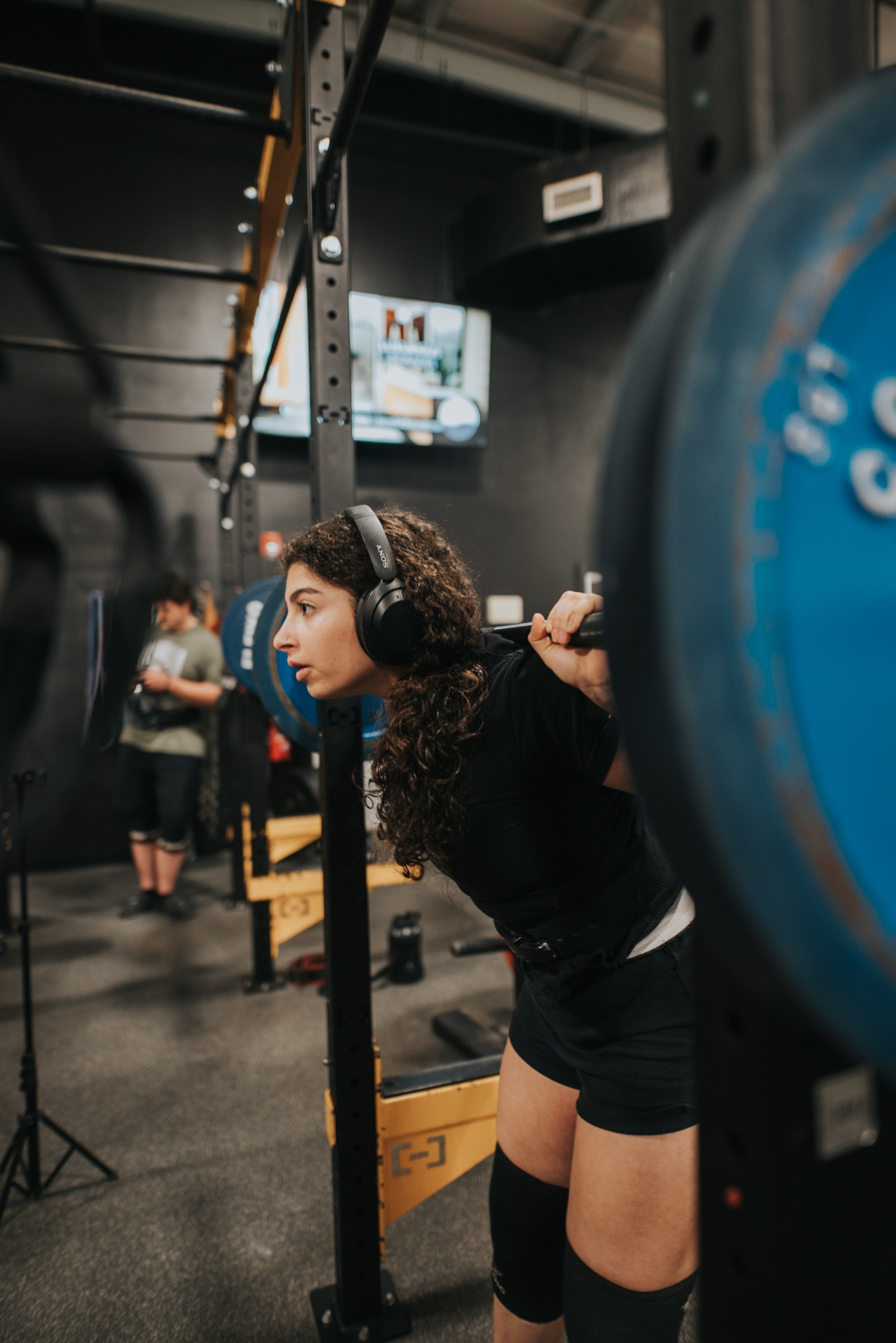Carinne training with a barbell